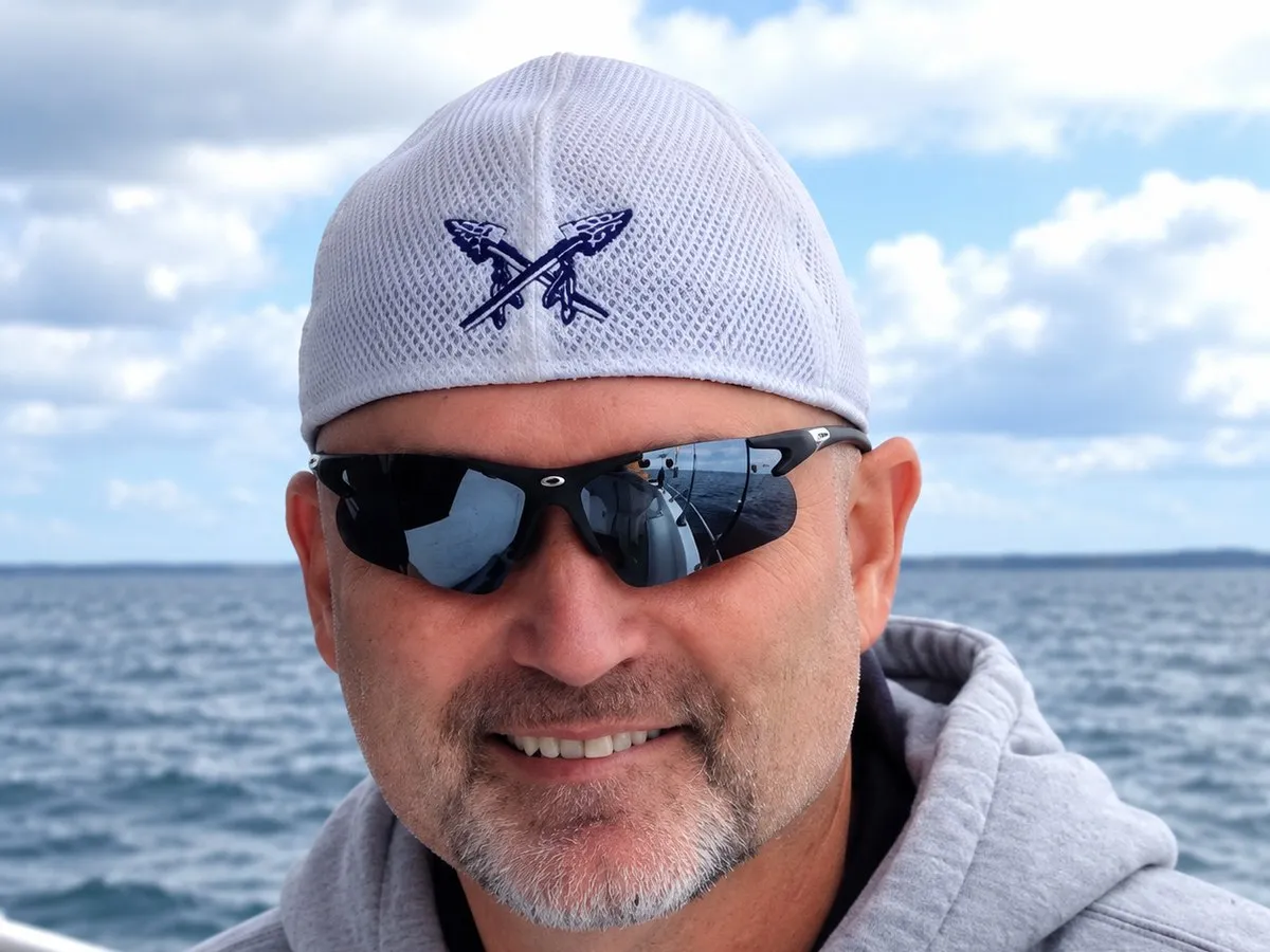 Bryan Collins on a boat on Long Island Sound